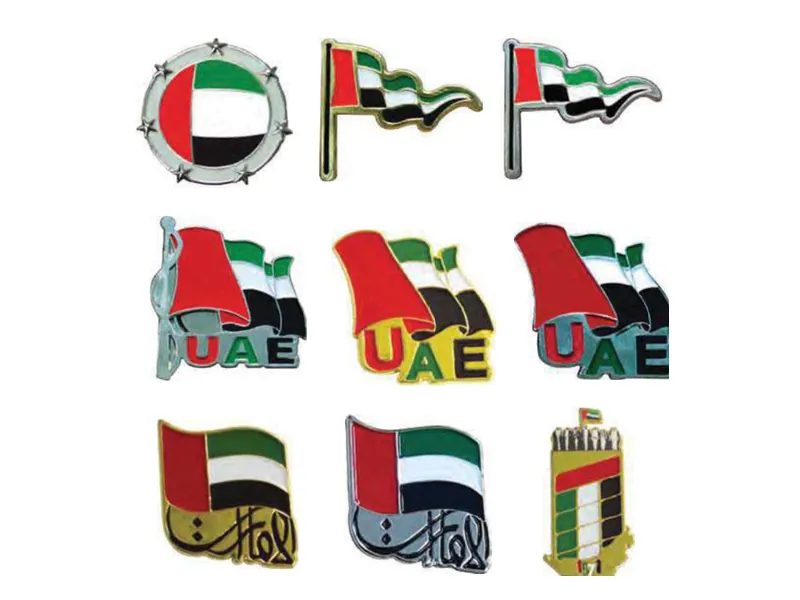 Gold and silver UAE flag lapel pins for National Day